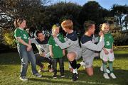 7 November 2011; Three, Sean St. Ledger, Simon Cox and Paul McShane, with children, left to right, Jade Pakenham, age 11, Bobby Pakenham, age 6, and Emma Hayes, age 5, all from Dublin, are asking Irish fans to  'Go Green With Pride' to show their support for the crucial EURO playoffs against Estonia on November 11th and 15th. Three will be providing face painters at the home leg to paint fans' faces green and placing 50K green cards for fans to hold up at the match on every chair in the Aviva Stadium on the 15th. Supporters can also still trade in their old Republic of Ireland football jerseys in any Champion Sports store nationwide and get €20 off the new home jersey. The traded in jerseys will be donated to Friends In Ireland, a charity founded by Marian Finucane that Sean St. Ledger is an ambassador with. The scheme has been extended to run until November 20th. Portmarnock Hotel and Golf Links, Portmarnock, Co. Dublin. Picture credit: David Maher / SPORTSFILE