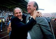 12 June 1988; Republic of Ireland manager Jack Charlton, right, and assistant manager Maurice Setters celebrate at the final whistle of the UEFA European Football Championship Finals Group B match between England and Republic of Ireland at Neckarstadion in Stuttgart, Germany. Photo by Ray McManus/Sportsfile
