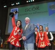 6 May 2017: Uachtarán Chumann Lúthchleas Aogán Ó Fearghail with Aoife Feeney and her team mates  after winning the 'Rince Foirne' section for the Glencar /Manaorhamilton GAA Club, from Co Leitrim, at the All-Ireland Scór Sinsear Finals at The Waterfront Theatre, Belfast Photo by Ray McManus/Sportsfile