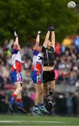 7 May 2017; Adrian McIntyre of Sligo in action against Patrick Boyle, left, and Brian Gallagher of New York during the Connacht GAA Football Senior Championship Preliminary Round match between New York and Sligo at Gaelic Park in the Bronx borough of New York City, USA. Photo by Stephen McCarthy/Sportsfile