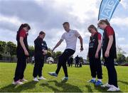 9 May 2017;  Shamrock Rovers player Paul Corry was in Bluebell Community Centre today at the AIG Heroes event along with pupils from St Ultans School in Cherry Orchard, Dublin. The AIG Heroes initiative is part of the insurance company’s community engagement programme and is designed to give support to local communities by leveraging their sporting sponsorships to provide positive role models and build confidence for young people. More information at www.aig.ie.  Bluebell Community College, Bluebell, Dublin. Photo by Sam Barnes/Sportsfile