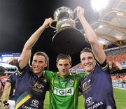 4 November 2011; Paddy Kelly, left, Eoin Cadogan, centre, and Aidan Walsh, Ireland, celebrate with the Cormac McAnallen Perpetual Trophy after the game. International Rules 2nd Test, Australia v Ireland, Metricon Stadium, Gold Coast, Australia. Picture credit: Ray McManus / SPORTSFILE
