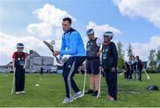 9 May 2017; Dublin hurler Conor Dooley was in Bluebell Community Centre today at the AIG Heroes event along with pupils from St Ultans School in Cherry Orchard, Dublin. The AIG Heroes initiative is part of the insurance company’s community engagement programme and is designed to give support to local communities by leveraging their sporting sponsorships to provide positive role models and build confidence for young people. More information at www.aig.ie.  More information at www.aig.ie. Bluebell Community College, Bluebell, Dublin. Photo by Sam Barnes/Sportsfile