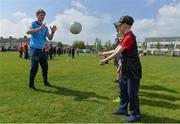 9 May 2017; Dublin footballer Michael Fitzsimons was in Bluebell Community Centre today at the AIG Heroes event along with pupils from St Ultans School in Cherry Orchard, Dublin. The AIG Heroes initiative is part of the insurance company’s community engagement programme and is designed to give support to local communities by leveraging their sporting sponsorships to provide positive role models and build confidence for young people. More information at www.aig.ie.  Photo by Sam Barnes/Sportsfile
