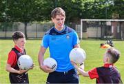 9 May 2017; Dublin footballer Michael Fitzsimons was in Bluebell Community Centre today at the AIG Heroes event along with pupils from St Ultans School in Cherry Orchard, Dublin. The AIG Heroes initiative is part of the insurance company’s community engagement programme and is designed to give support to local communities by leveraging their sporting sponsorships to provide positive role models and build confidence for young people. More information at www.aig.ie.  Bluebell Community College, Bluebell, Dublin. Photo by Sam Barnes/Sportsfile
