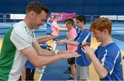 11 May 2017; Over 200 students from across Ireland gathered in the National Sports Campus, Abbottstown, today to take part in an athletics masterclass with European Indoor Championship gold medallist, David Gillick. Bank of Ireland and Athletics Ireland joined forces in 2016 to launch a nationwide search amongst secondary schools to identify and foster talented athletics students and today these students participated in a masterclass with David Gillick. As well as taking part in athletics activities with David Gillick, the students received advice and tips from Ireland’s top sports psychologists and nutritionists. Pictured taking part in the masterclass today alongside David Gillick is Henry McErlan, age 14, from St Michael's College, Dublin, playing a game to improve reflexes. Photo by Cody Glenn/Sportsfile