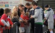 12 November 2011; Republic of Ireland's Stephen Ward signs autographs for young fans before squad training ahead of their UEFA EURO2012 Qualifying Play-off 2nd leg match against Estonia on Tuesday. Republic of Ireland Squad Training, Gannon Park, Malahide, Dublin. Picture credit: Brendan Moran / SPORTSFILE