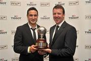 12 November 2011; Eamon Zayed, left, Derry City, is presented with the Tissot PFAI Premier division player of the year award by Republic of Ireland goalkeeping coach Alan Kelly at the Tissot PFAI Player of the Year Awards 2011. Burlington Hotel, Dublin. Picture credit: David Maher / SPORTSFILE