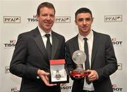 12 November 2011; Enda Stevens, right, Shamrock Rovers, is presented with the Tissot PFAI young player of the year award by Republic of Ireland goalkeeping coach Alan Kelly at the Tissot PFAI Player of the Year Awards 2011. Burlington Hotel, Dublin. Picture credit: David Maher / SPORTSFILE