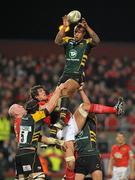 12 November 2011; Courtney Lawes, Northampton Saints, wins possession for his side in the line-out ahead of Donncha O'Callaghan, Munster. Heineken Cup, Pool 1, Round 1, Munster v Northampton Saints, Thomond Park, Limerick. Picture credit: Diarmuid Greene / SPORTSFILE
