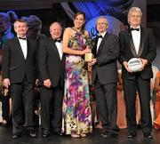 12 November 2011; Aine Tighe, Leitrim, is presented with the Intermediate Players' Player of the Year by John Treacy, Chief Executive of the Irish Sports Council, in the company of, from left, Pol O Gallchoir, Ceannsai, TG4, Pat Quill, President, Ladies Gaelic Football Association, and Tony Towell, Managing Director, O'Neill's, at the O'Neills TG4 Ladies Football All-Star Awards 2011. Citywest Hotel, Saggart, Co. Dublin. Picture credit: Brendan Moran / SPORTSFILE