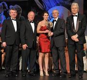 12 November 2011; Sinead Aherne, Dublin, is presented with her All-Star award by John Treacy, Chief Executive of the Irish Sports Council, in the company of, from left, Pol O Gallchoir, Ceannsai, TG4, Pat Quill, President, Ladies Gaelic Football Association, and Tony Towell, Managing Director, O'Neill's, at the O'Neills TG4 Ladies Football All-Star Awards 2011. Citywest Hotel, Saggart, Co. Dublin. Picture credit: Brendan Moran / SPORTSFILE
