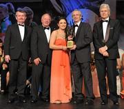 12 November 2011; Lucy Mulhall, Wicklow, is presented with the Junior Players' Player of the Year by John Treacy, Chief Executive of the Irish Sports Council, in the company of, from left, Pol O Gallchoir, Ceannsai, TG4, Pat Quill, President, Ladies Gaelic Football Association, and Tony Towell, Managing Director, O'Neill's, at the O'Neills TG4 Ladies Football All-Star Awards 2011. Citywest Hotel, Saggart, Co. Dublin. Picture credit: Brendan Moran / SPORTSFILE