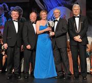 12 November 2011; Mary Kirwan, Laois, is presented with her All-Star award by John Treacy, Chief Executive of the Irish Sports Council, in the company of, from left, Pol O Gallchoir, Ceannsai, TG4, Pat Quill, President, Ladies Gaelic Football Association, and Tony Towell, Managing Director, O'Neill's, at the O'Neills TG4 Ladies Football All-Star Awards 2011. Citywest Hotel, Saggart, Co. Dublin. Picture credit: Brendan Moran / SPORTSFILE