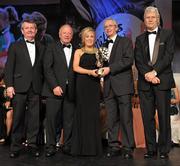 12 November 2011; Ciara McAnespie, Monaghan, is presented with her All-Star award by John Treacy, Chief Executive of the Irish Sports Council, in the company of, from left, Pol O Gallchoir, Ceannsai, TG4, Pat Quill, President, Ladies Gaelic Football Association, and Tony Towell, Managing Director, O'Neill's, at the O'Neills TG4 Ladies Football All-Star Awards 2011. Citywest Hotel, Saggart, Co. Dublin. Picture credit: Brendan Moran / SPORTSFILE