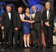12 November 2011; Rhona Ni Bhuachalla, Cork, is presented with her All-Star award by John Treacy, Chief Executive of the Irish Sports Council, in the company of, from left, Pol O Gallchoir, Ceannsai, TG4, Pat Quill, President, Ladies Gaelic Football Association, and Tony Towell, Managing Director, O'Neill's, at the O'Neills TG4 Ladies Football All-Star Awards 2011. Citywest Hotel, Saggart, Co. Dublin. Picture credit: Brendan Moran / SPORTSFILE