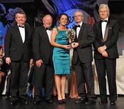 12 November 2011; Geraldine O'Flynn, Cork, is presented with her All-Star award by John Treacy, Chief Executive of the Irish Sports Council, in the company of, from left, Pol O Gallchoir, Ceannsai, TG4, Pat Quill, President, Ladies Gaelic Football Association, and Tony Towell, Managing Director, O'Neill's, at the O'Neills TG4 Ladies Football All-Star Awards 2011. Citywest Hotel, Saggart, Co. Dublin. Picture credit: Brendan Moran / SPORTSFILE