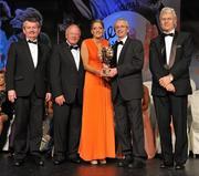 12 November 2011; Juliet Murphy, Cork, is presented with her All-Star award by John Treacy, Chief Executive of the Irish Sports Council, in the company of, from left, Pol O Gallchoir, Ceannsai, TG4, Pat Quill, President, Ladies Gaelic Football Association, and Tony Towell, Managing Director, O'Neill's, at the O'Neills TG4 Ladies Football All-Star Awards 2011. Citywest Hotel, Saggart, Co. Dublin. Picture credit: Brendan Moran / SPORTSFILE