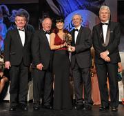 12 November 2011; Therese McNally, Monaghan, is presented with her All-Star award by John Treacy, Chief Executive of the Irish Sports Council, in the company of, from left, Pol O Gallchoir, Ceannsai, TG4, Pat Quill, President, Ladies Gaelic Football Association, and Tony Towell, Managing Director, O'Neill's, at the O'Neills TG4 Ladies Football All-Star Awards 2011. Citywest Hotel, Saggart, Co. Dublin. Picture credit: Brendan Moran / SPORTSFILE
