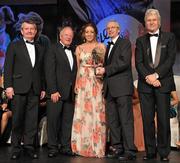 12 November 2011; Elaine Kelly, Dublin, is presented with her All-Star award by John Treacy, Chief Executive of the Irish Sports Council, in the company of, from left, Pol O Gallchoir, Ceannsai, TG4, Pat Quill, President, Ladies Gaelic Football Association, and Tony Towell, Managing Director, O'Neill's, at the O'Neills TG4 Ladies Football All-Star Awards 2011. Citywest Hotel, Saggart, Co. Dublin. Picture credit: Brendan Moran / SPORTSFILE