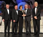 12 November 2011; Grainne McNally, Monaghan, is presented with her All-Star award by John Treacy, Chief Executive of the Irish Sports Council, in the company of, from left, Pol O Gallchoir, Ceannsai, TG4, Pat Quill, President, Ladies Gaelic Football Association, and Tony Towell, Managing Director, O'Neill's, at the O'Neills TG4 Ladies Football All-Star Awards 2011. Citywest Hotel, Saggart, Co. Dublin. Picture credit: Brendan Moran / SPORTSFILE