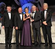 12 November 2011; Sharon Courtney, Monaghan, is presented with her All-Star award by John Treacy, Chief Executive of the Irish Sports Council, in the company of, from left, Pol O Gallchoir, Ceannsai, TG4, Pat Quill, President, Ladies Gaelic Football Association, and Tony Towell, Managing Director, O'Neill's, at the O'Neills TG4 Ladies Football All-Star Awards 2011. Citywest Hotel, Saggart, Co. Dublin. Picture credit: Brendan Moran / SPORTSFILE