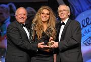 12 November 2011; Sarah Rowe, Mayo, is presented with the Connacht Young Player of the Year award by John Treacy, Chief Executive of the Irish Sports Council, in the company of Pat Quill, President, Ladies Gaelic Football Association, at the O'Neills TG4 Ladies Football All-Star Awards 2011. Citywest Hotel, Saggart, Co. Dublin. Picture credit: Brendan Moran / SPORTSFILE