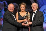 12 November 2011; Michelle Farrell, Longford, is presented with the Leinster Young Player of the Year award by John Treacy, Chief Executive of the Irish Sports Council, in the company of Pat Quill, President, Ladies Gaelic Football Association, at the O'Neills TG4 Ladies Football All-Star Awards 2011. Citywest Hotel, Saggart, Co. Dublin. Picture credit: Brendan Moran / SPORTSFILE