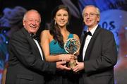 12 November 2011; Ciara McDermott, Monaghan, is presented with the Ulster Young Player of the Year award by John Treacy, Chief Executive of the Irish Sports Council, in the company of Pat Quill, President, Ladies Gaelic Football Association, at the O'Neills TG4 Ladies Football All-Star Awards 2011. Citywest Hotel, Saggart, Co. Dublin. Picture credit: Brendan Moran / SPORTSFILE