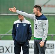 14 November 2011; Republic of Ireland captain Robbie Keane, as manager Giovanni Trapattoni looks on, during squad training ahead of their UEFA EURO2012 Qualifying Play-off 2nd leg match against Estonia on Tuesday. Republic of Ireland Squad Training, Gannon Park, Malahide, Dublin. Picture credit: David Maher / SPORTSFILE