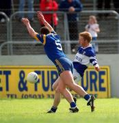 6 May 2002; Michael Lawlor of Laois in action against Tom Burke of Wicklow during the Bank of Ireland Leinster Senior Football Championship First Round match between Laois and Wicklow at Dr Cullen Park in Carlow. Photo by Brendan Moran/Sportsfile