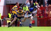 19 May 2002; Brendan Dunne of Tipperary in action against Frank Lohan of Clare during the Guinness Munster Senior Hurling Championship Quarter-Final match between Tipperary and Clare at Páirc U’ Chaoimh in Cork. Photo by Ray McManus/Sportsfile
