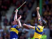 19 May 2002; Gerry Quinn of Clare in action against Conor Gleeson of Tipperary during the Guinness Munster Senior Hurling Championship Quarter-Final match between Tipperary and Clare at Páirc U’ Chaoimh in Cork. Photo by Ray McManus/Sportsfile