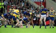 19 May 2002; Clare and Tipperary players contest for possession during the Guinness Munster Senior Hurling Championship Quarter-Final match between Tipperary and Clare at Páirc U’ Chaoimh in Cork. Photo by Brendan Moran/Sportsfile