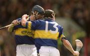 19 May 2002; Tipperary's Eoin Kelly, right, celebrates with team-mate John O'Brien scoring his side's goal during the Guinness Munster Senior Hurling Championship Quarter-Final match between Tipperary and Clare at Páirc Uí Chaoimh in Cork. Photo by Brendan Moran/Sportsfile