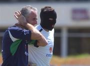 22 May 2002; Republic of Ireland manager Mick McCarthy, left, poses for a picture alongside goalkeeper Alan Kelly, wearing a balaclava, during a Republic of Ireland squad training session at Ada Gym in Susupe, Saipan, Northern Mariana Islands. Photo by David Maher/Sportsfile