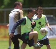 22 May 2002; Gary Kelly holds off the challange from his team-mate Alan Kelly during a Republic of Ireland squad training session at Ada Gym in Susupe, Saipan, Northern Mariana Islands. Photo by David Maher/Sportsfile