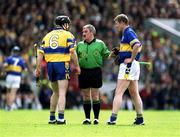 19 May 2002; Referee Pat Horan speaks to Sean McMahon of Clare, left, and Conor Gleeson of Tipperary during the Guinness Munster Senior Hurling Championship Quarter-Final match between Tipperary and Clare at Páirc U’ Chaoimh in Cork. Photo by Brendan Moran/Sportsfile