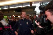 17 May 2002; Republic of Ireland captain Roy Keane at Dublin Airport prior to the team's departure to their training camp in Saipan, Northern Mariana Islands, ahead of the FIFA World Cup 2002 Finals in Japan and South Korea. Photo by Ray McManus/Sportsfile