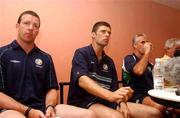 23 May 2002; Republic of Ireland players Alan Kelly, left, Niall Quinn, centre, and manager Mick McCarthy during a press conference to announce the departure from the squad of captain Roy Keane, at The Hyatt Hotel in Mutcho, Saipan, Northern Mariana Islands. Photo by David Maher/Sportsfile
