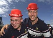23 May 2002; Munster players Martin Cahill, left, and John Langford after arriving at Cardiff Airport ahead of their Heineken Cup Final match against Leicester Tigers at the Millennium Stadium in Cardiff, Wales. Photo by Brendan Moran/Sportsfile