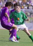 25 May 2002; Robbie Keane of Republic of Ireland in action against Koji Morisaki of Sanfrecce Hiroshima during the friendly match between Sanfrecce Hiroshima and Republic of Ireland at Hamayama Park in Izumo, Japan. Photo by David Maher/Sportsfile