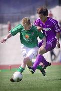25 May 2002; Damien Duff of Republic of Ireland in action against Yuichi Komano of Sanfrecce Hiroshima during the friendly match between Sanfrecce Hiroshima and Republic of Ireland at Hamayama Park in Izumo, Japan. Photo by David Maher/Sportsfile