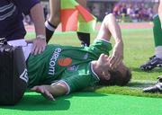 25 May 2002; Jason McAteer of Republic of Ireland receives treatment following an injury during the friendly match between Sanfrecce Hiroshima and Republic of Ireland at Hamayama Park in Izumo, Japan. Photo by David Maher/Sportsfile