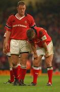 25 May 2002; Munster captain Mick Galwey, left, consoles Ronan O'Gara following their side's defeat during the Heineken Cup Final match between Leicester Tigers and Munster at the Millennium Stadium in Cardiff, Wales. Photo by Matt Browne/Sportsfile