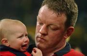 25 May 2002; Munster captain Mick Galwey with his daughter Ailbhe after the final whistle following his side's defeat during the Heineken Cup Final match between Leicester Tigers and Munster at the Millennium Stadium in Cardiff, Wales. Photo by Brendan Moran/Sportsfile