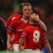 25 May 2002; Munster captain Mick Galwey, left, consoles Peter Stringer following their side's defeat during the Heineken Cup Final match between Leicester Tigers and Munster at the Millennium Stadium in Cardiff, Wales. Photo by Brendan Moran/Sportsfile