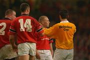 25 May 2002; Munster players Peter Stringer, right, John O'Neill, 14, and Frank Sheahan, left, remonstrate with referee Jo‘l Jutge, after Neal Back had fouled in the scrum, during the Heineken Cup Final match between Leicester Tigers and Munster at the Millennium Stadium in Cardiff, Wales. Photo by Matt Browne/Sportsfile