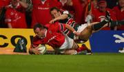 25 May 2002; Munster's Jon O'Neill dives over for a try, despite the tackle of Leicester's Austin Healy, which was subsequently disallowed, during the Heineken Cup Final match between Leicester Tigers and Munster at the Millennium Stadium in Cardiff, Wales. Photo by Brendan Moran/Sportsfile
