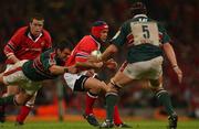 25 May 2002; Mike Mullins of Munster in action against Martin Johnson, left, and Ben Kay of Leicester during the Heineken Cup Final match between Leicester Tigers and Munster at the Millennium Stadium in Cardiff, Wales. Photo by Brendan Moran/Sportsfile